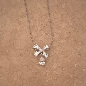 Elegant 14k and diamond Bow Necklace
